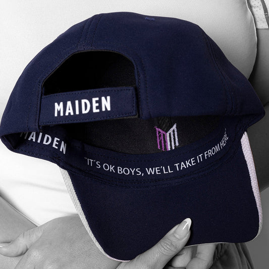 Navy blue cap with 'MAIDEN' branding held by a person