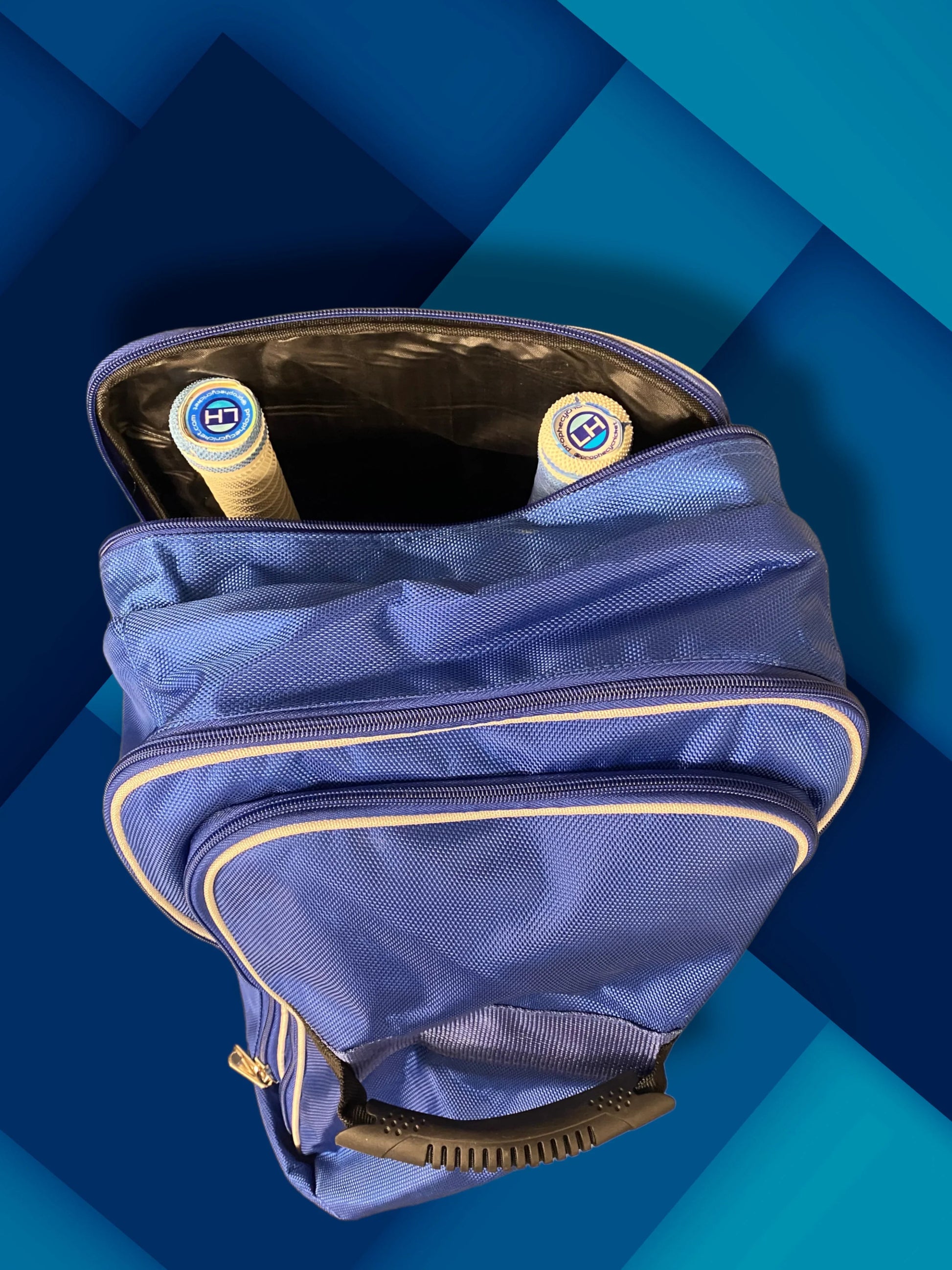 Blue cooler bag with bottles on a blue geometric background