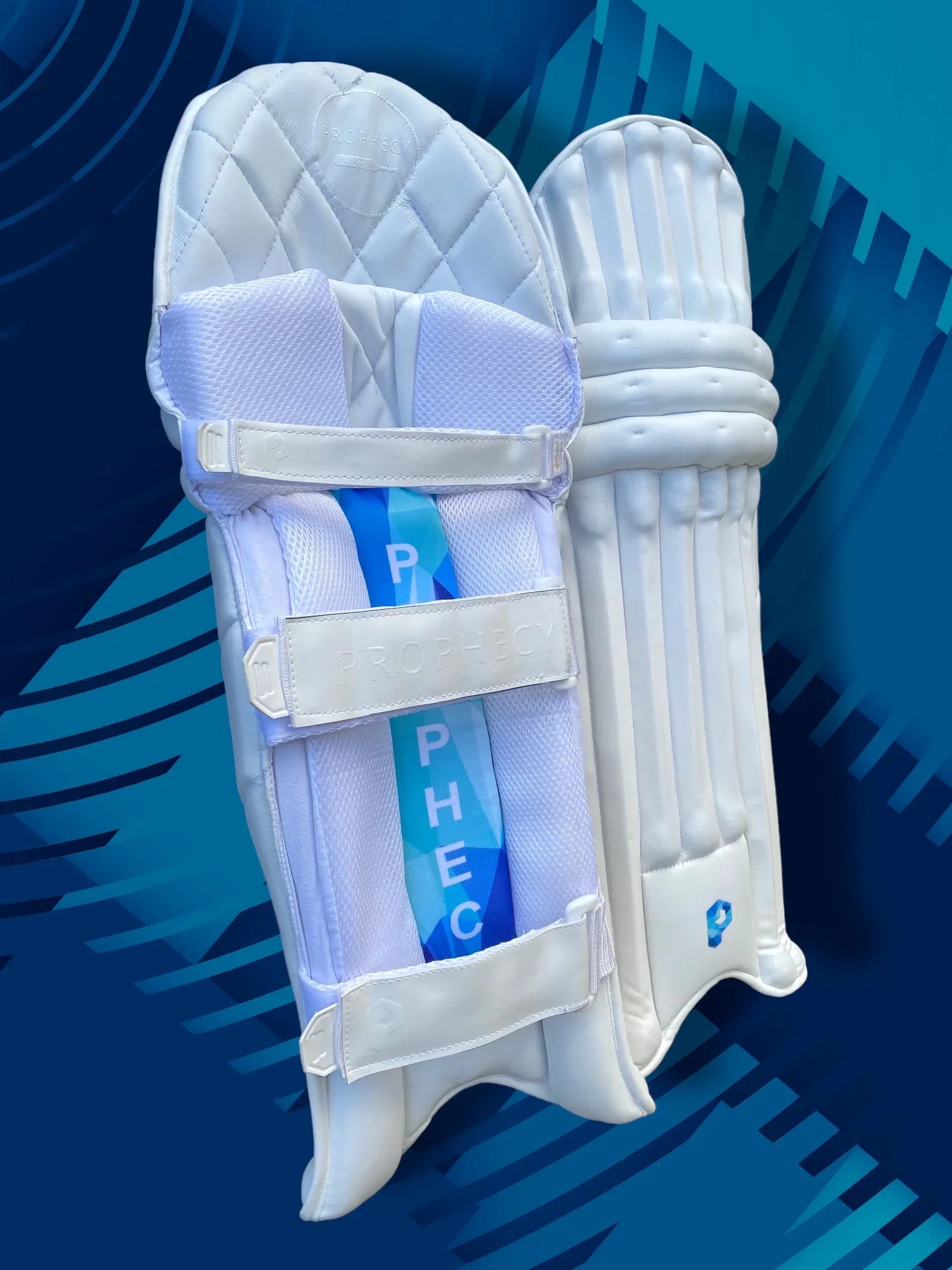 White cricket pads with blue branding on a blue background