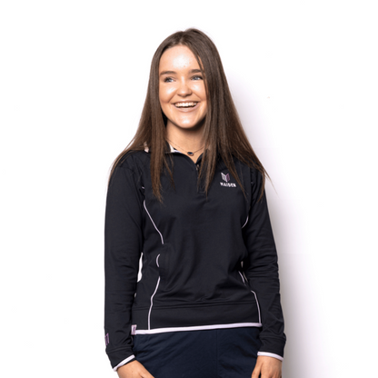 Woman wearing a black pullover with a logo on a white background